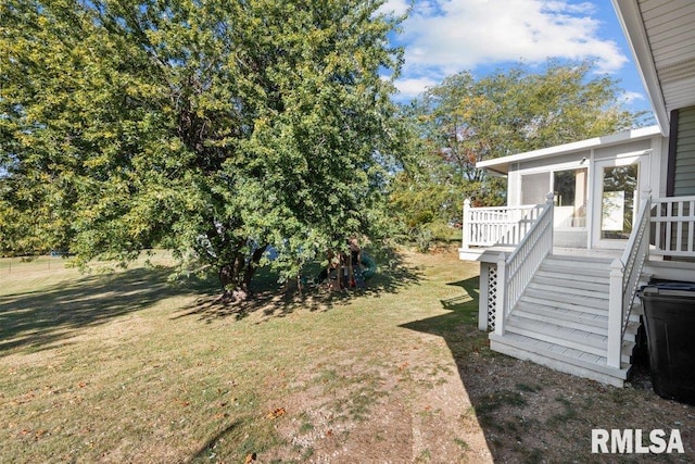 view of yard featuring a deck