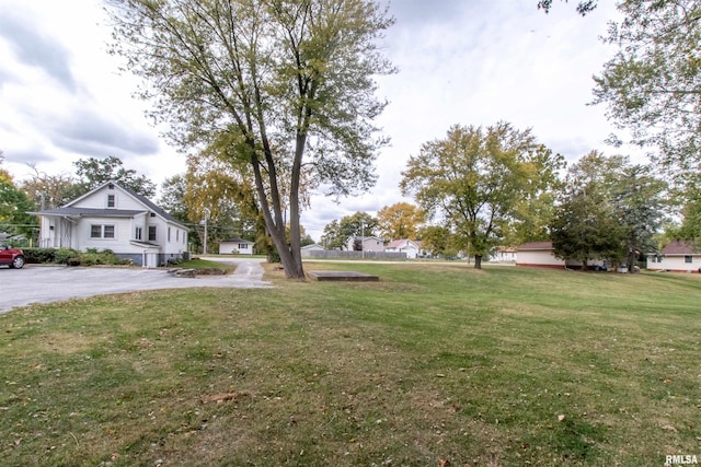 view of yard featuring a garage