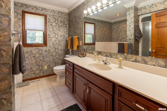 bathroom with vanity, toilet, tile patterned floors, and plenty of natural light