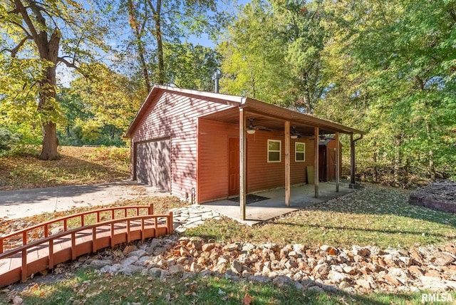 view of outdoor structure with a garage