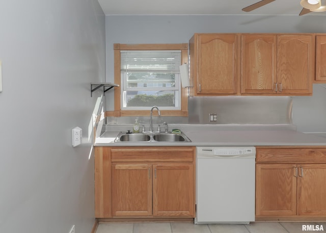 kitchen with white dishwasher, sink, ceiling fan, and light tile patterned floors