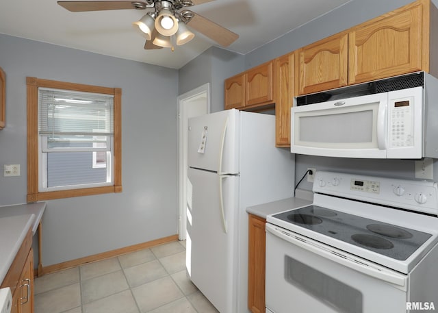 kitchen featuring white appliances, ceiling fan, and light tile patterned flooring