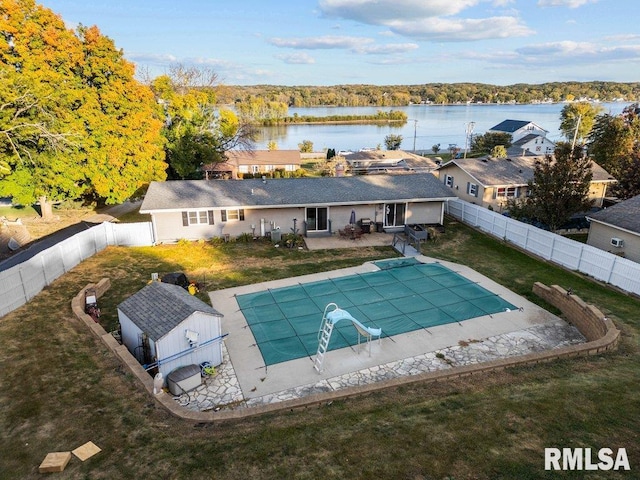 exterior space with a water view