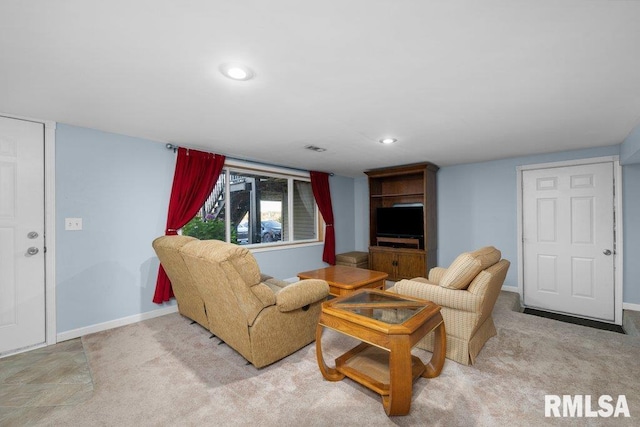 living room featuring light carpet