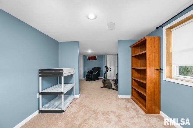 interior space featuring light colored carpet