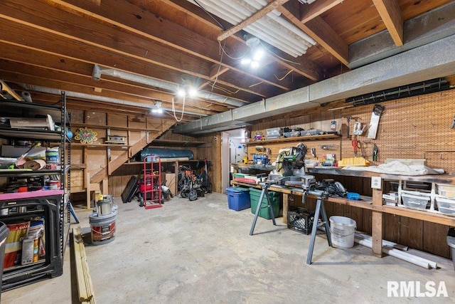 basement with a workshop area