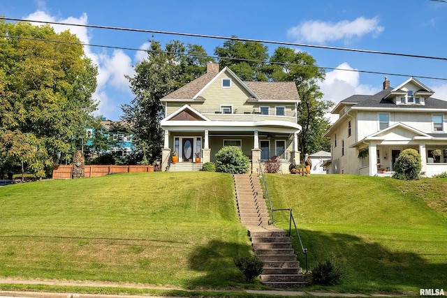 craftsman-style house with a porch and a front lawn