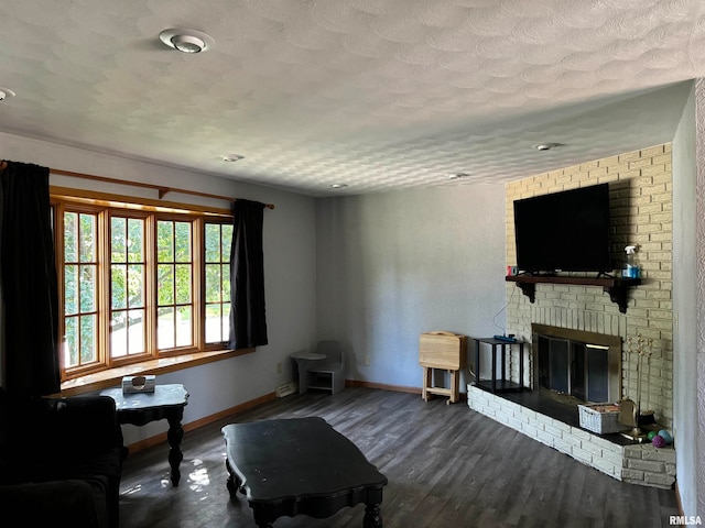 living room featuring hardwood / wood-style flooring and a fireplace