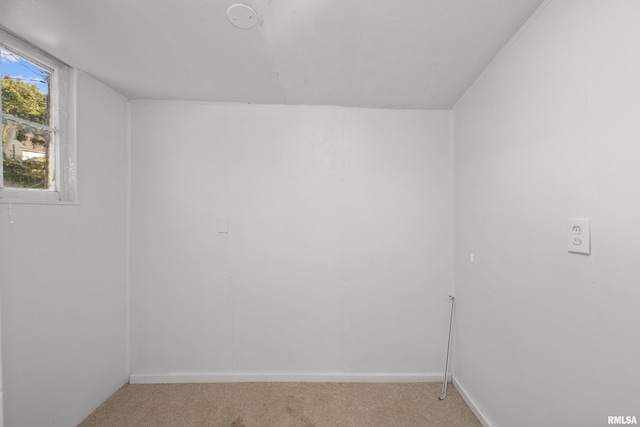 empty room featuring light colored carpet