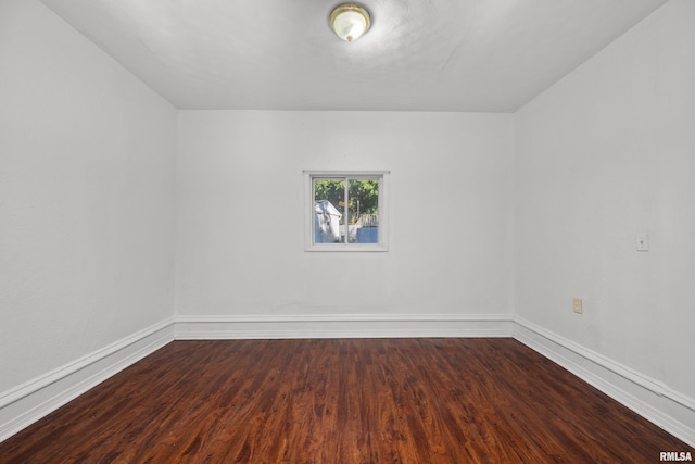 unfurnished room featuring wood-type flooring