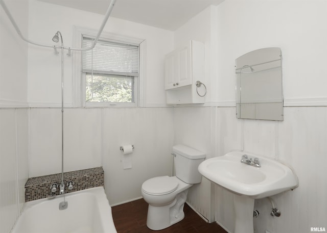 bathroom featuring toilet and hardwood / wood-style floors