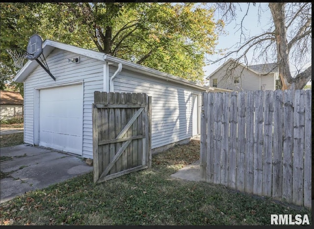 view of outbuilding featuring a garage