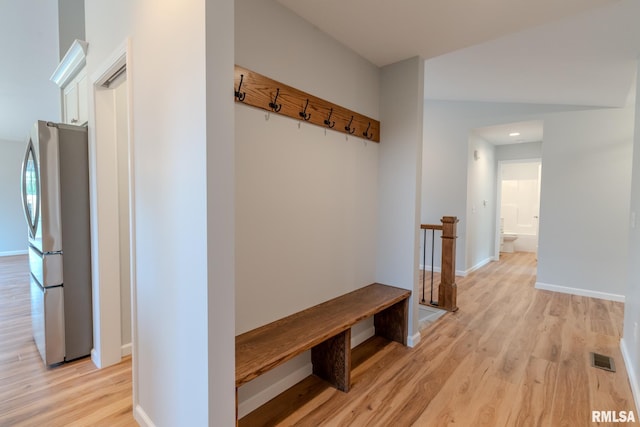 941 9th Ave N, Clinton, IA 52732 - mudroom with light wood finished floors and baseboards