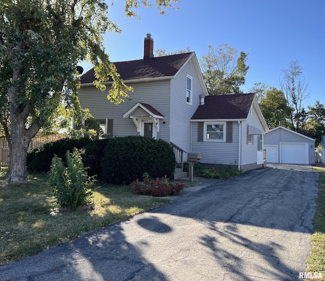 view of property exterior featuring a garage and an outbuilding