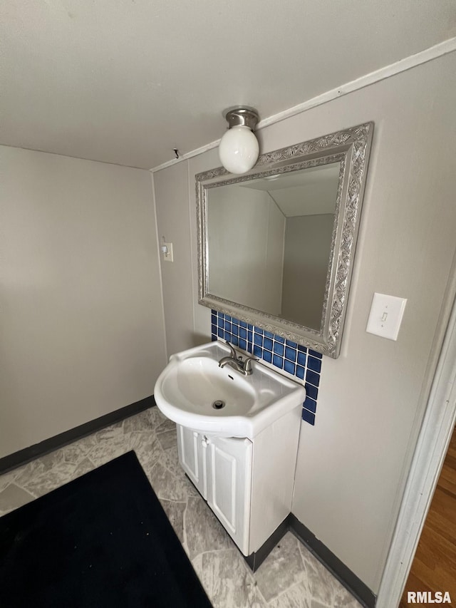 bathroom featuring backsplash and wood-type flooring