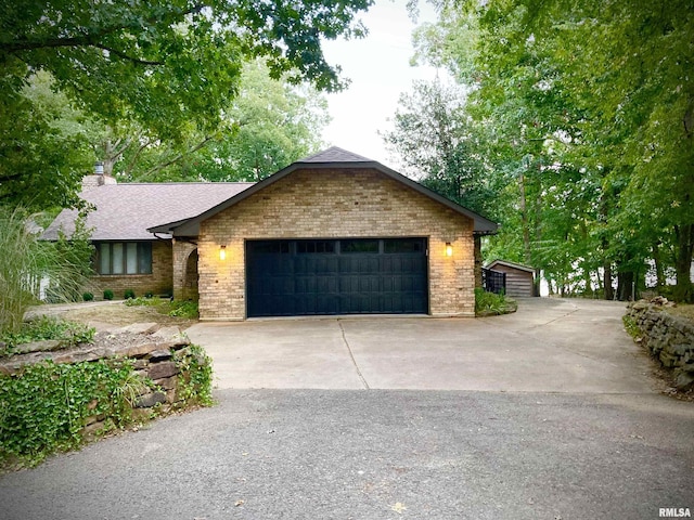 ranch-style house featuring a garage