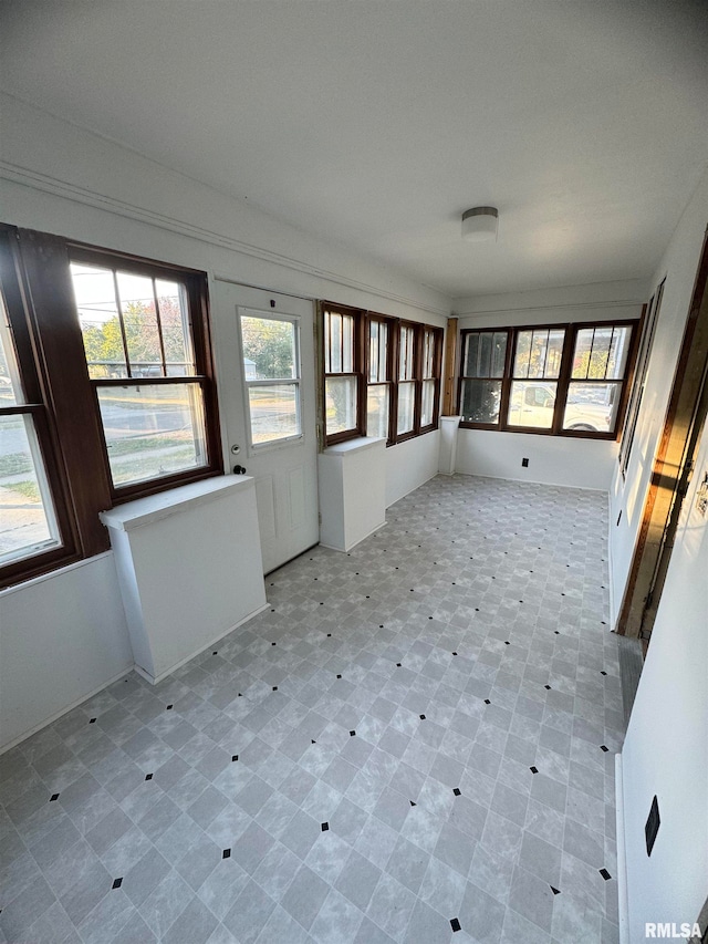 view of unfurnished sunroom