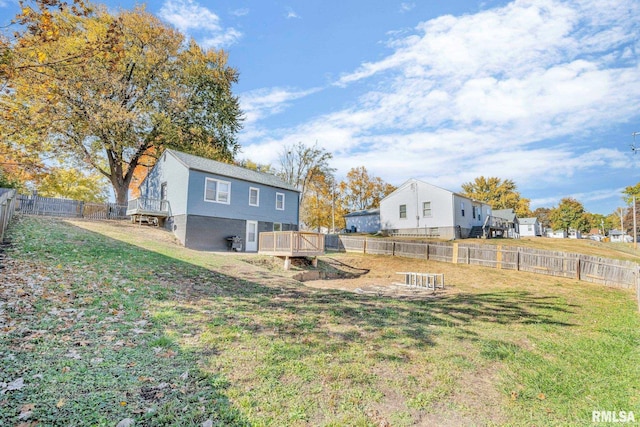 view of yard featuring a wooden deck