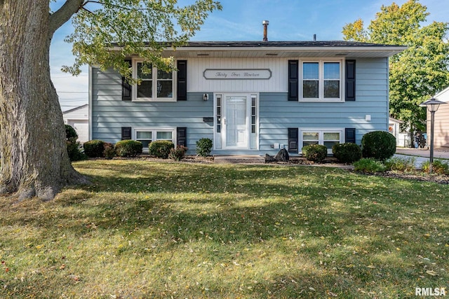 split foyer home with a front yard