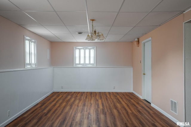 empty room featuring dark wood-type flooring