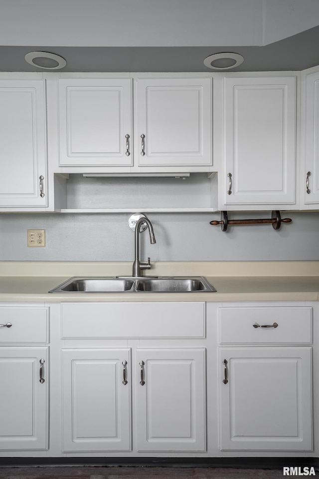 kitchen with white cabinets and sink