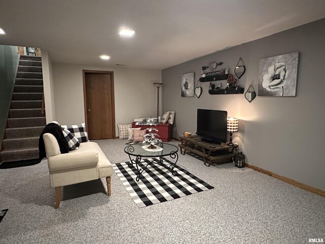 living room with recessed lighting, carpet floors, baseboards, and stairs