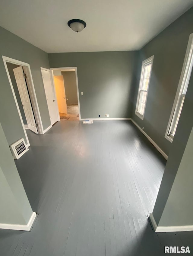 empty room featuring hardwood / wood-style floors