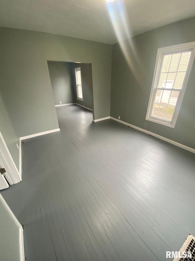 spare room featuring hardwood / wood-style floors