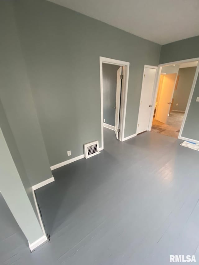 1621 14 1/2 St, Rock Island, IL 61201 - unfurnished bedroom featuring baseboards