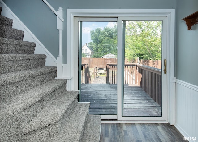 1325 13th Ave, East Moline, IL 61264 - doorway to outside with stairway, healthy amount of natural light, and wood finished floors