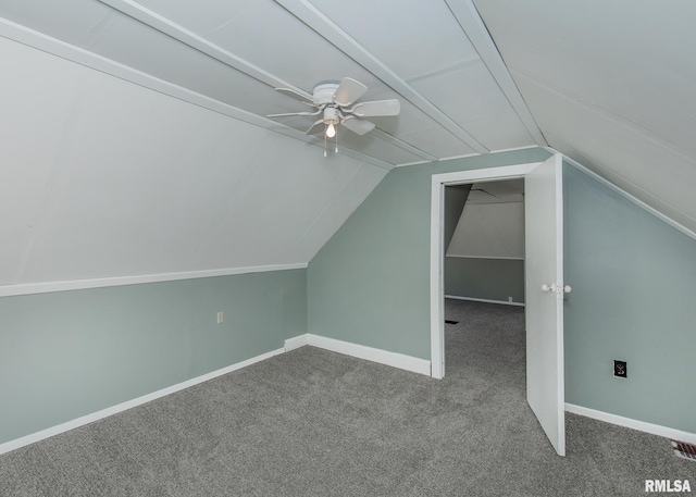 bonus room featuring ceiling fan, vaulted ceiling, and carpet floors