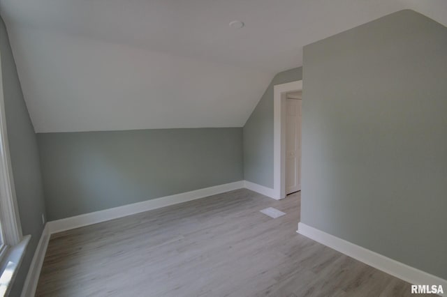 2312 W 1st St, Davenport, IA 52802 - bonus room featuring lofted ceiling and light wood finished floors