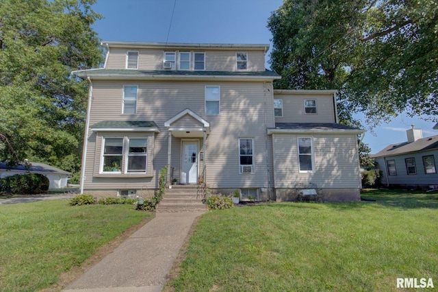 view of front of property featuring a front yard