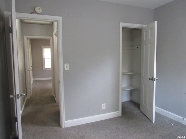 unfurnished bedroom featuring light colored carpet