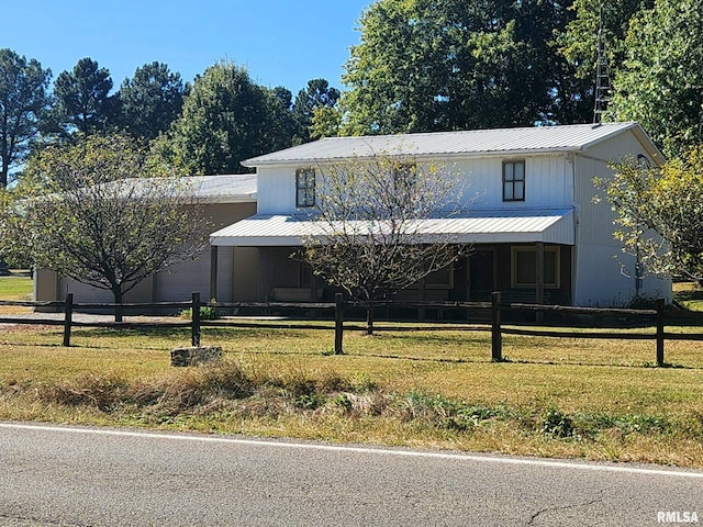 view of front of property with a front lawn