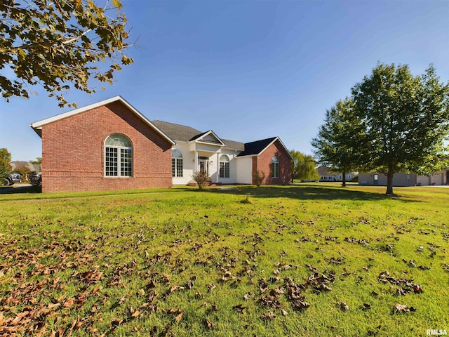 exterior space with a front yard