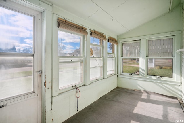 unfurnished sunroom with vaulted ceiling