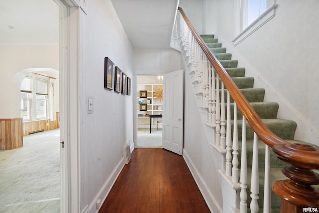 hallway with wood-type flooring