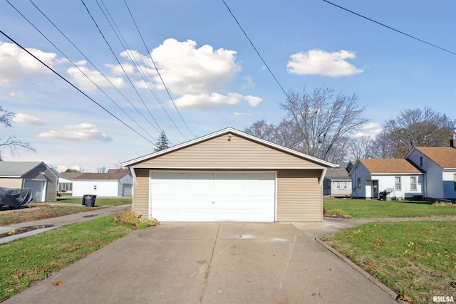 garage with a lawn