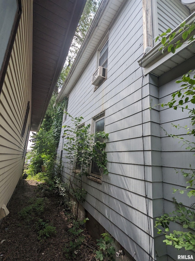 view of home's exterior featuring cooling unit