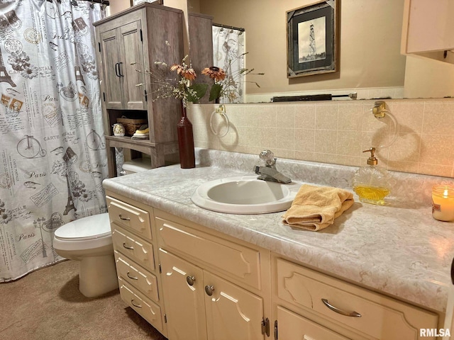 bathroom featuring vanity, walk in shower, toilet, and backsplash