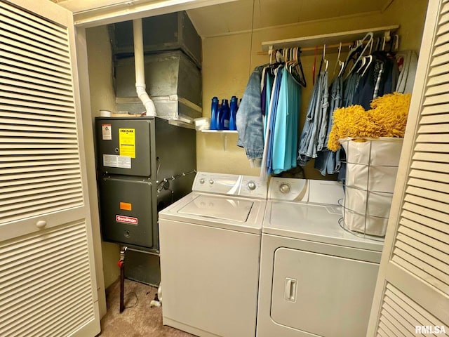 laundry room featuring washing machine and clothes dryer