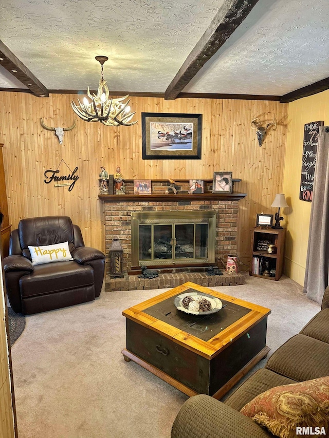 carpeted living room with beamed ceiling, wooden walls, a brick fireplace, and a textured ceiling