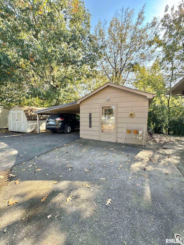 garage with a carport