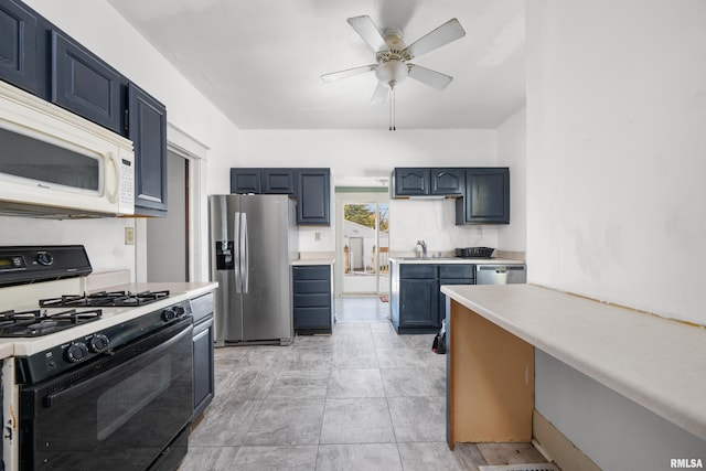 kitchen with ceiling fan, appliances with stainless steel finishes, and blue cabinets