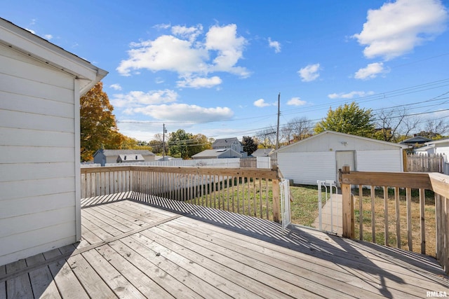 deck featuring an outdoor structure