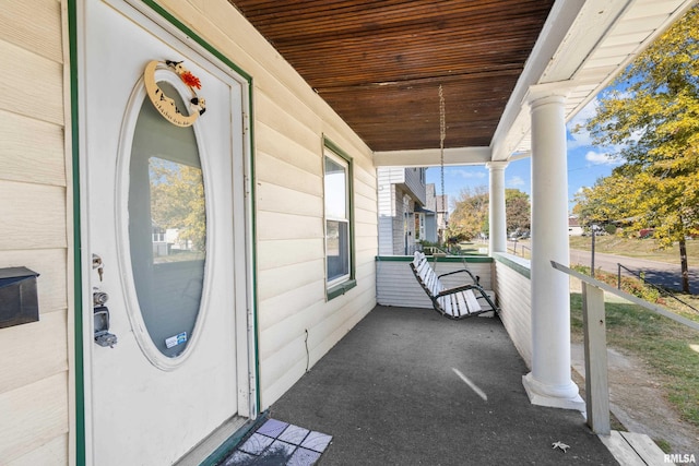 view of patio featuring a porch