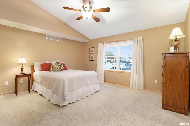 bedroom featuring ceiling fan, carpet flooring, and vaulted ceiling