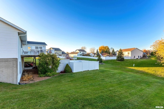 view of yard with a deck