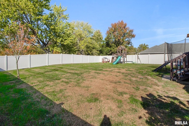 view of yard featuring a playground